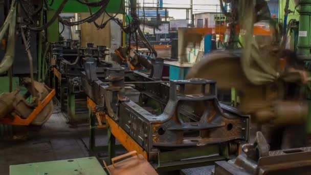 Conveyor assembly stage the body of tractor at big industrial factory timelapse — Stock Video