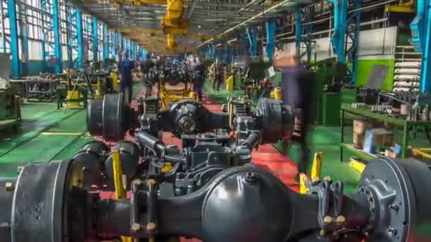 Conveyor assembly stage the body of tractor at big industrial factory timelapse — Stock Video