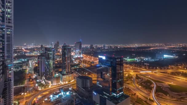 Vista aérea da cidade de mídia e da área do distrito de al barsha heights durante toda a noite timelapse da marina de Dubai. — Vídeo de Stock