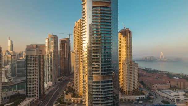 Panoramic view of the Dubai Marina and JBR area and the famous Ferris Wheel aerial morning timelapse — Stock Video