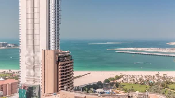 The beach at JBR with golden sand near seaside aerial timelapse — Stock Video