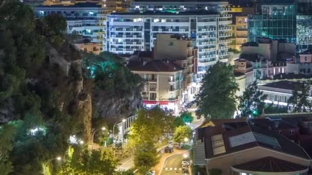 Panorama de Monte Carlo timelapse por la noche desde la plataforma de observación en el pueblo de Mónaco cerca de Port Hércules . — Vídeo de stock