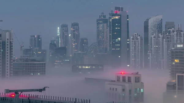 Dubai Wolkenkrabbers Met Ochtendmist Business Bay District Nacht Tot Dag — Stockfoto