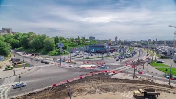 Aerial view of a large city intersection with road construction site urban works timelapse. — Wideo stockowe