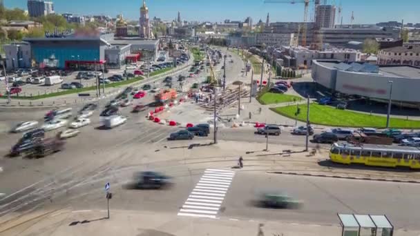 Installing concrete plates by crane on intersection at road construction site timelapse. — Vídeos de Stock