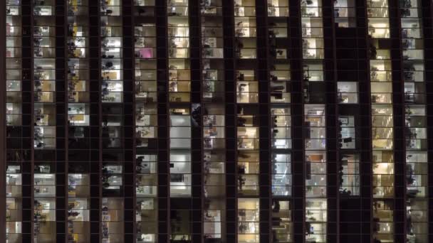 Windows em arranha-céus International Business Center City à noite timelapse vídeo vertical — Vídeo de Stock