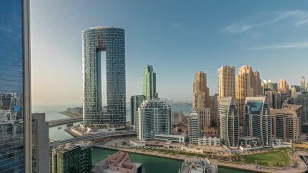 Panorama showing Dubai Marina skyscrapers and JBR district with luxury buildings and resorts aerial timelapse — Stock Video