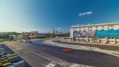 Çalışan işçiler finişer makineleri Asfalt yol yapımı sırasında ve tamir timelapse İnşaat