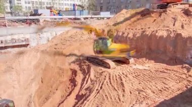 A large huge ditch pit tunnel timelapse at the construction site of the underground metro station line.