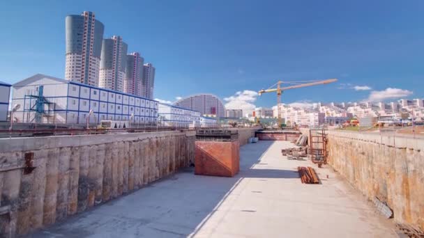 A large huge ditch pit tunnel timelapse at the construction site of the underground metro station line. — Stockvideo