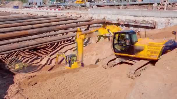 A large huge ditch pit tunnel timelapse at the construction site of the underground metro station line. — Stok Video