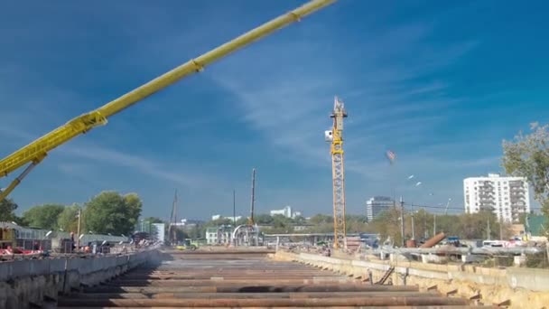 Huge ditch pit at the construction site of the underground metro station line timelapse. — Stock video