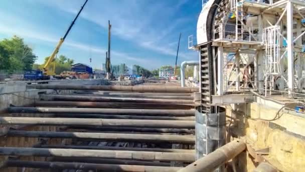 Huge ditch pit at the construction site of the underground metro station line timelapse. — Stok Video