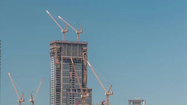 Edifícios Vários Andares Construção Muitos Guindastes Amarelos Timelapse Com Céu — Fotografia de Stock