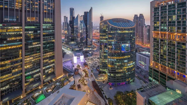 Διεθνές Οικονομικό Κέντρο Του Ντουμπάι Ουρανοξύστες Εναέρια Μέρα Νύχτα Μετάβαση — Φωτογραφία Αρχείου