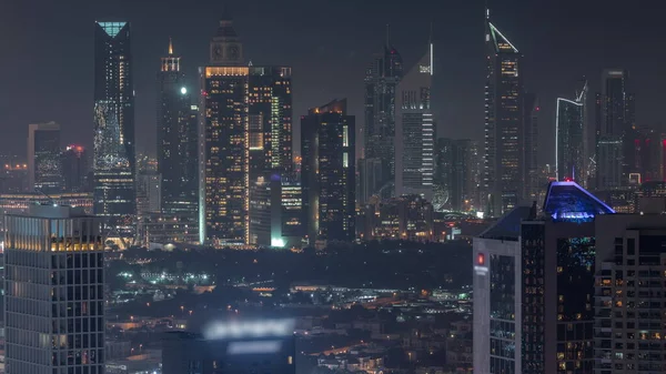 Rijen Wolkenkrabbers Het Financiële District Dubai Luchtfoto Nachtelijke Tijdspanne Panoramisch — Stockfoto