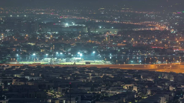 Vista Aérea Muchas Casas Apartamentos Ciudad Dubai Desde Noche Timelapse —  Fotos de Stock