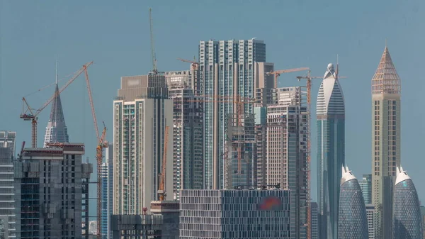Filas Rascacielos Distrito Financiero Dubai Sitio Construcción Con Muchas Grúas —  Fotos de Stock
