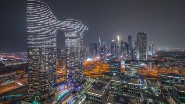 Futurista Dubai Downtown e distrito financeiro horizonte aéreo noite timelapse. — Vídeo de Stock