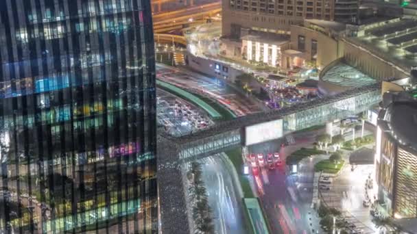 Overhead view of transport on a busy road in Dubai downtown aerial night timelapse, United Arab Emirates — Stock Video