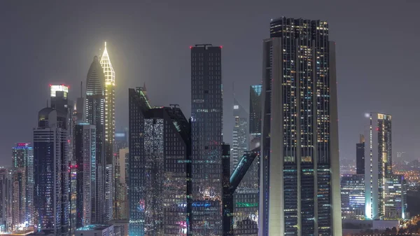 Närbild Dubai Financial Center Distrikt Med Höga Skyskrapor Upplysta Natten — Stockfoto