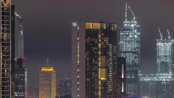 Torens Dubai International Financial Centre District Luchtfoto Nachtelijke Tijdspanne Kantoorgebouwen — Stockfoto