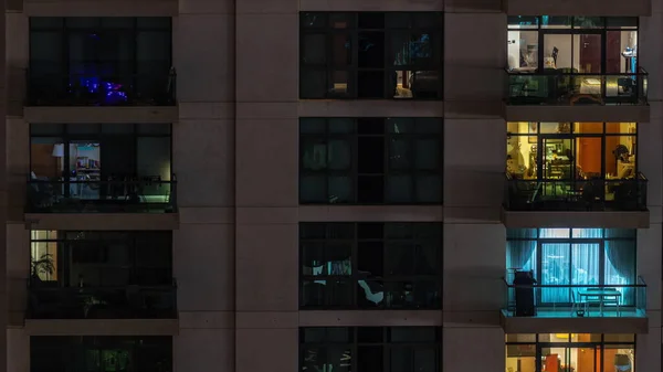 Windows Apartment Building Night Timelapse Light Illuminated Rooms Houses Chairs — Stock Photo, Image