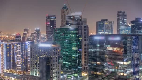 Business Bay Dubai Megvilágított Felhőkarcolók Városi Fények Tükröződnek Üveg Légi — Stock videók