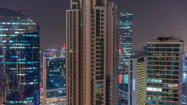 Business Bay Dubai Φωτίζονται Ουρανοξύστες Νερό Κανάλι Εναέρια Νύχτα Timelapse — Φωτογραφία Αρχείου