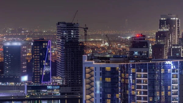 Business Bay Dubaj Osvětlené Mrakodrapy Staveniště Vodní Kanál Letecké Noci — Stock fotografie