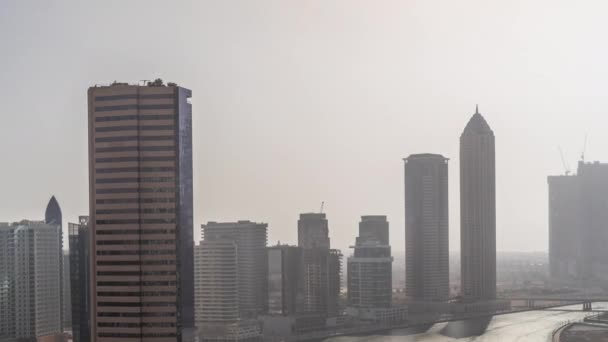 Rascacielos Cityscape Dubai Business Bay Con Timelapse Aéreo Del Canal — Vídeos de Stock