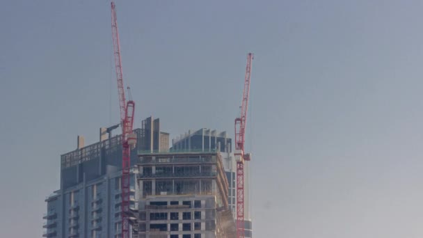 Two Cranes Working Constraction Site New Skyscraper Timelapse High Rise — Stock Video