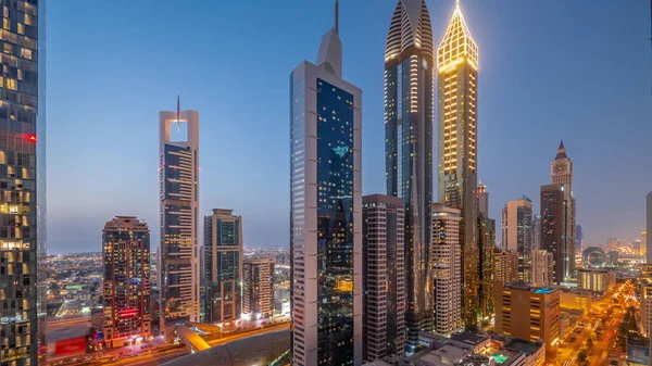 Αεροφωτογραφία Του Dubai International Financial District Πολλούς Ουρανοξύστες Μέρα Νύχτα — Φωτογραφία Αρχείου