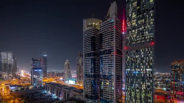 Flygfoto Över Dubai International Financial District Med Många Skyskrapor Natt — Stockvideo