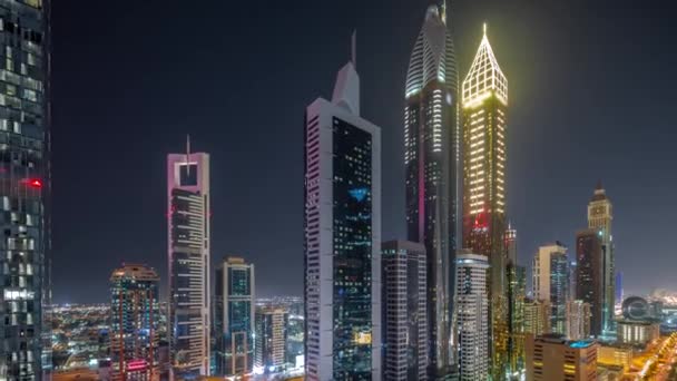 Flygfoto Över Dubai International Financial District Med Många Skyskrapor Natt — Stockvideo