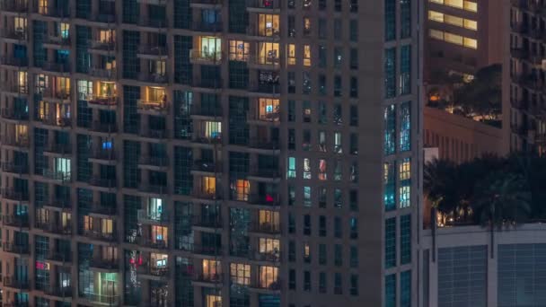 Windows High Rise Building Exterior Late Evening Glowing Blinking Interior — Stock Video