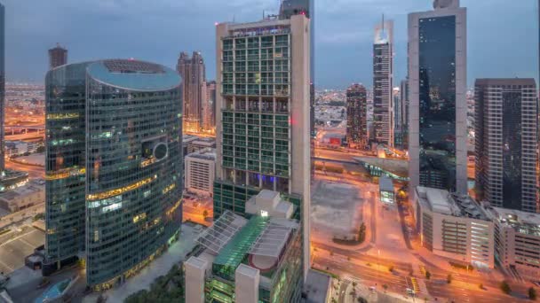 Διεθνές Οικονομικό Κέντρο Του Ντουμπάι Ουρανοξύστες Εναέρια Νύχτα Την Ημέρα — Αρχείο Βίντεο