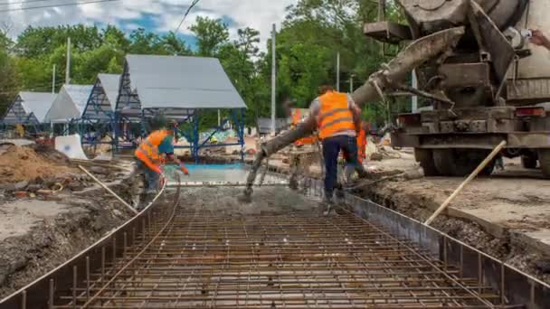 Concrete Works Metal Reinforcement Road Construction Many Workers Uniform Excavators — ストック動画