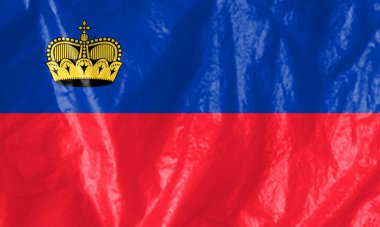 Liechtenstein bayrağı. Mavi renk, ülkenin üzerindeki gökyüzünün mavisini temsil ediyor. Kırmızı renk, Liechtenstein dağlarındaki parlak günbatımını simgeliyor..