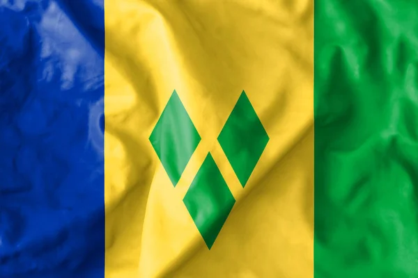 圣文森特和格林纳丁斯国旗 圣文森特和格林纳丁斯的国旗是由蓝色 黄色和绿色三条垂直条纹组成的三色旗 — 图库照片