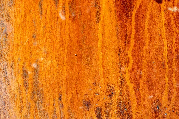 Rusty burnt metal of armored vehicles. metal texture with scratches and cracks