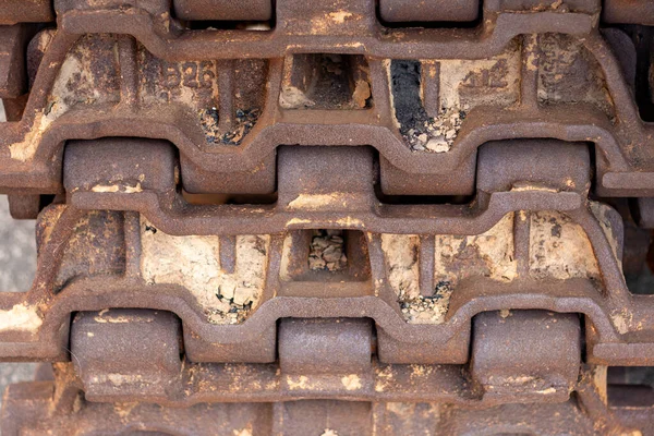 old rusty metal tire on a white background