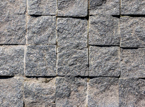 Textura Uma Parede Pedra Com Fendas Arranhões Que Podem Usar — Fotografia de Stock