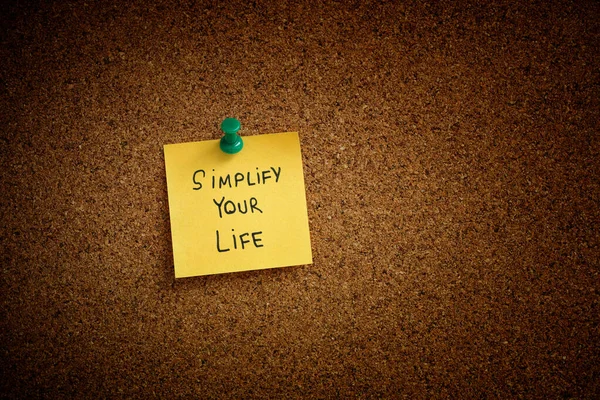 Yellow Sticky Note Phrase Simplify Your Life Written Pinned Cork — Stock Photo, Image