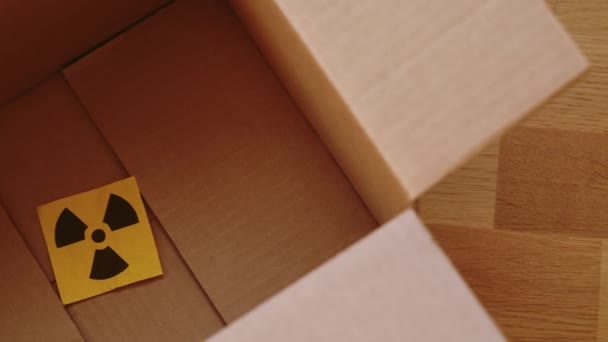 Radiation Warning Sign Cardboard Box Close — Stock Video