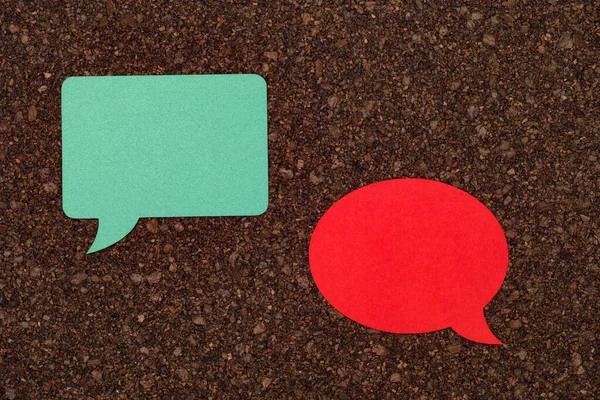 Two Speech Bubbles Laying Cork Board Close — Zdjęcie stockowe