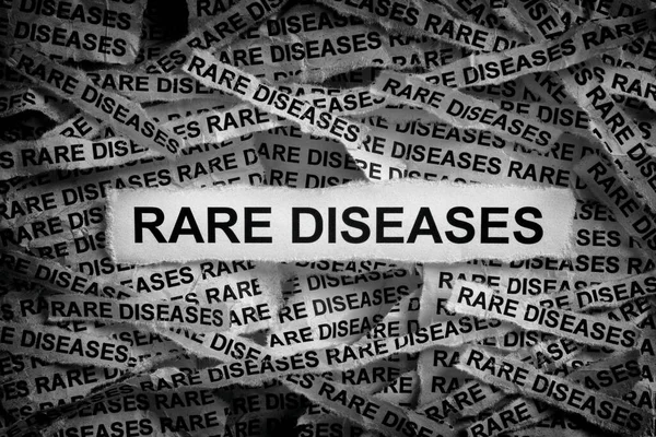 Strips Newspaper Words Rare Diseases Black White Close — Stock Photo, Image