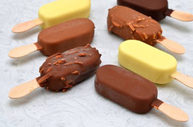 ice cream on a stick on a light background