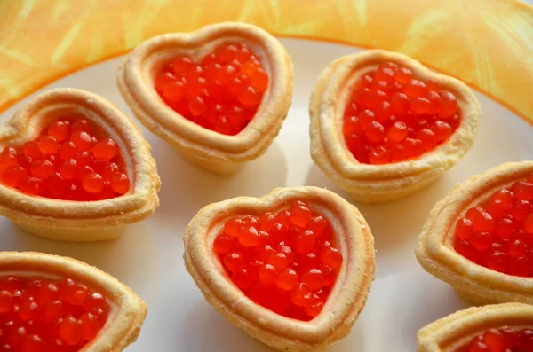 red caviar heart shaped snacks