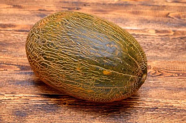 Świeży Dojrzałego Melona Cały Podłoże Drewniane — Zdjęcie stockowe